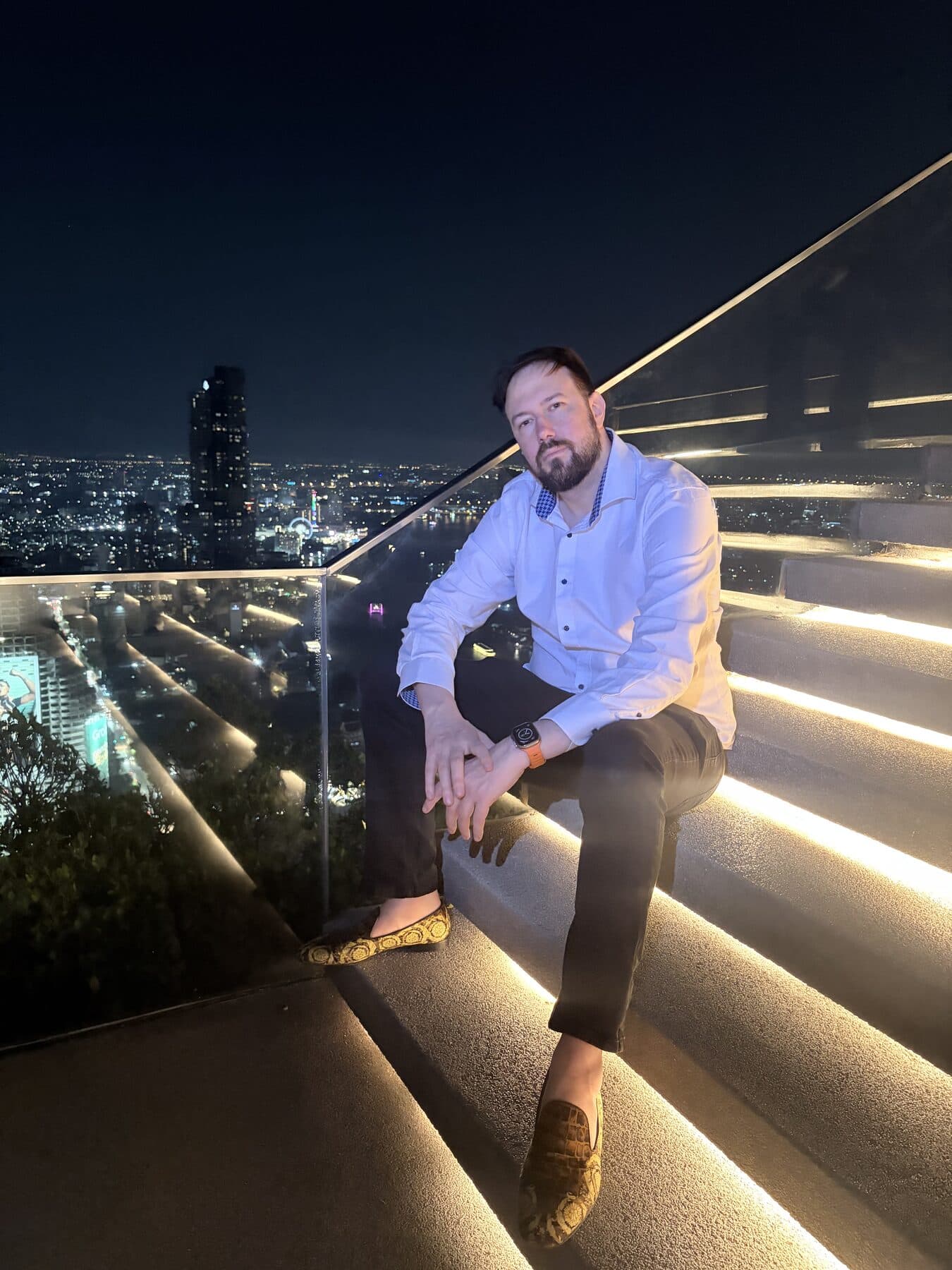 Oliver Locke, founder of Eclix Technologies, on the stairs of Lebua Tower in Bangkok